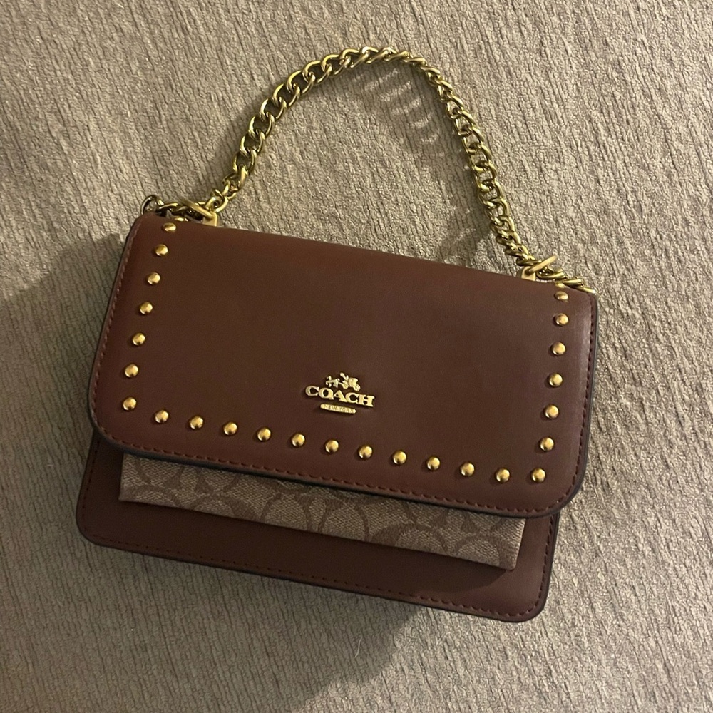 Brand new Coach cross body purse.